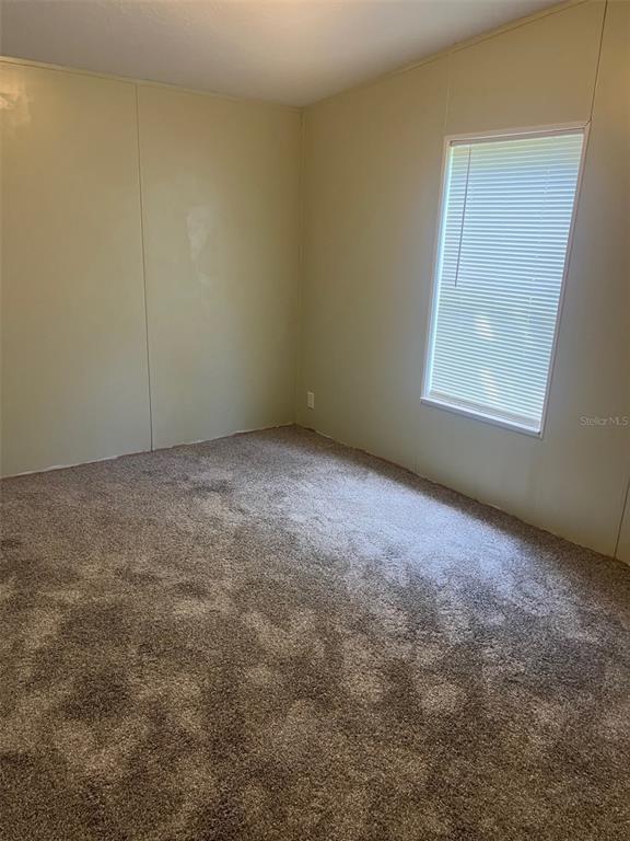 328 Old Peniel Road Palatka, FL 32177 - Photo 10 of 18 an empty room with a window