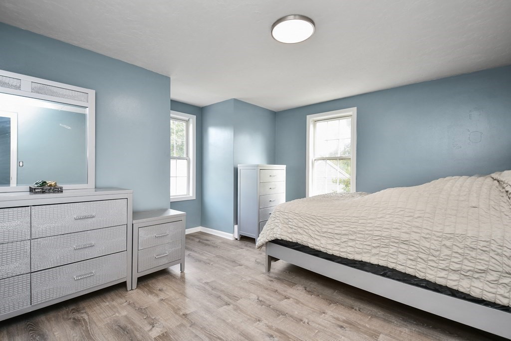 44 Catalpa Circle Worcester, MA 01603 - Photo 17 of 29 a spacious bedroom with a bed and a dresser