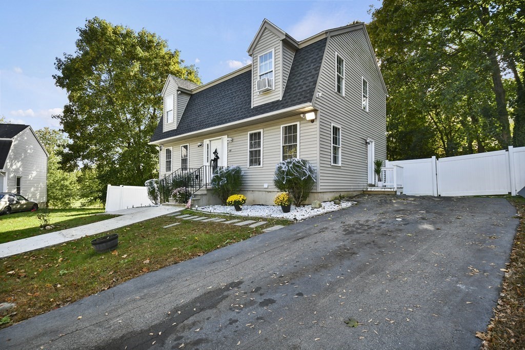 44 Catalpa Circle Worcester, MA 01603 - Photo 2 of 29 a front view of house with yard and trees around