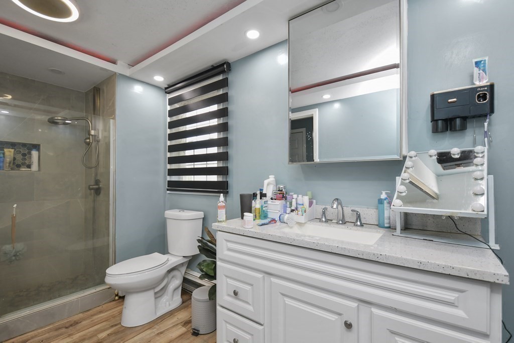 44 Catalpa Circle Worcester, MA 01603 - Photo 21 of 29 a bathroom with a sink a toilet and shower