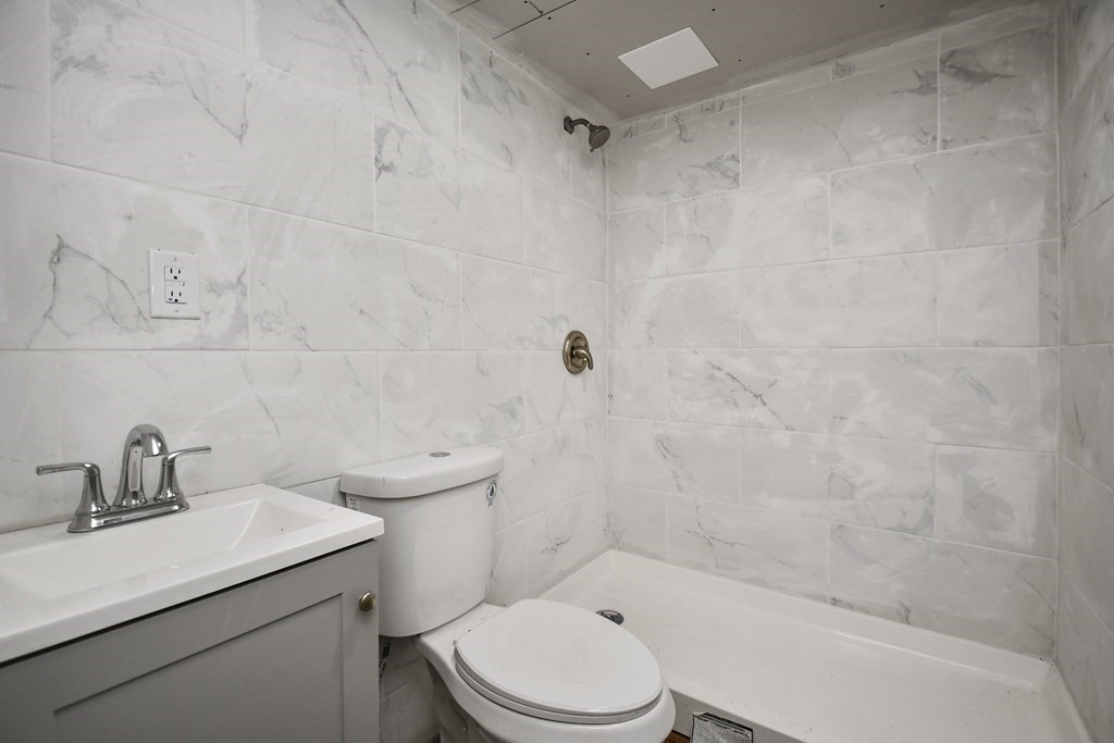 44 Catalpa Circle Worcester, MA 01603 - Photo 25 of 29 a bathroom with a sink toilet and shower