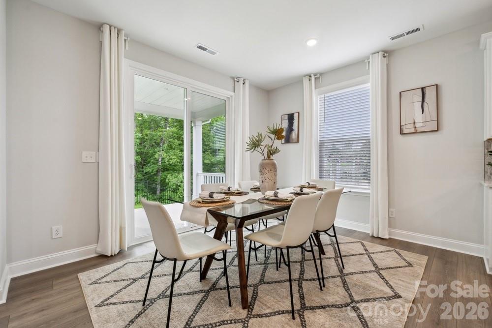 5029 Duval Circle Tega Cay, SC 29708 - Photo 15 of 47 a view of a dining room with furniture and window