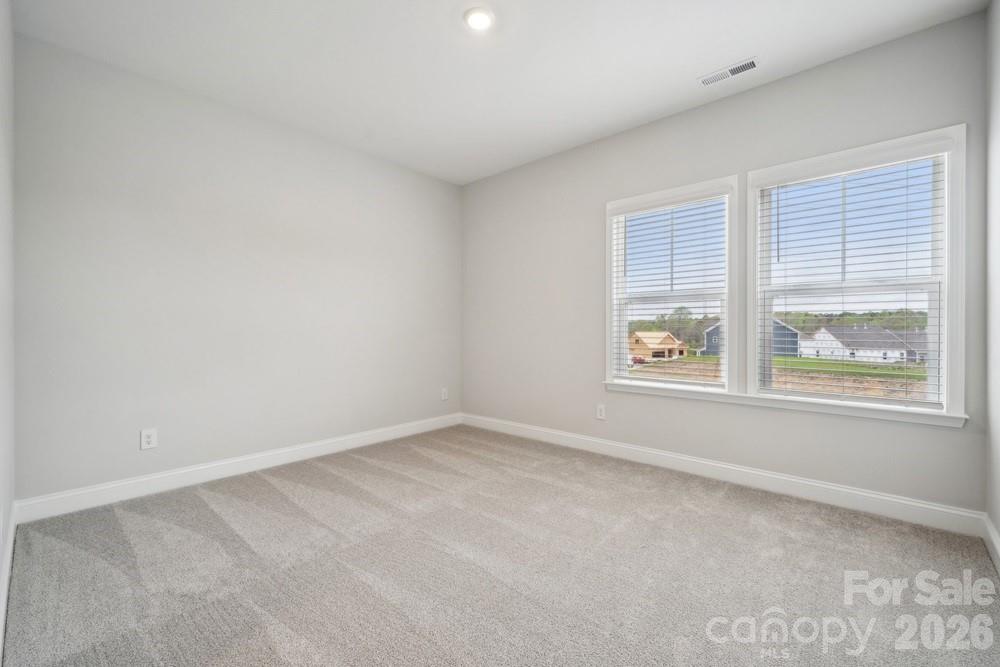 5029 Duval Circle Tega Cay, SC 29708 - Photo 29 of 47 an empty room with windows