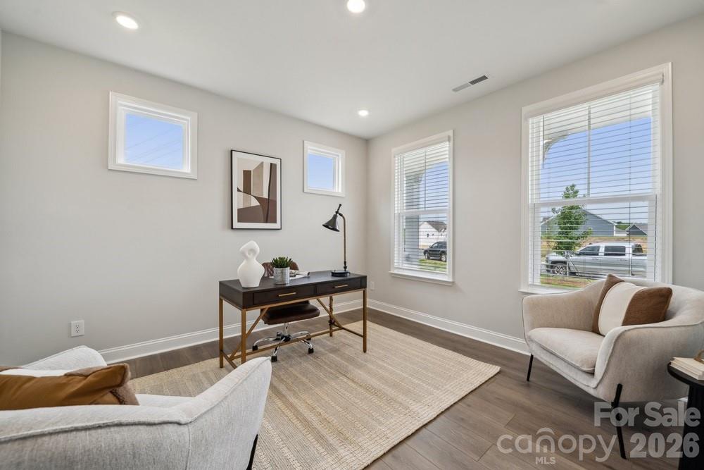 5029 Duval Circle Tega Cay, SC 29708 - Photo 9 of 47 a living room with furniture and a window