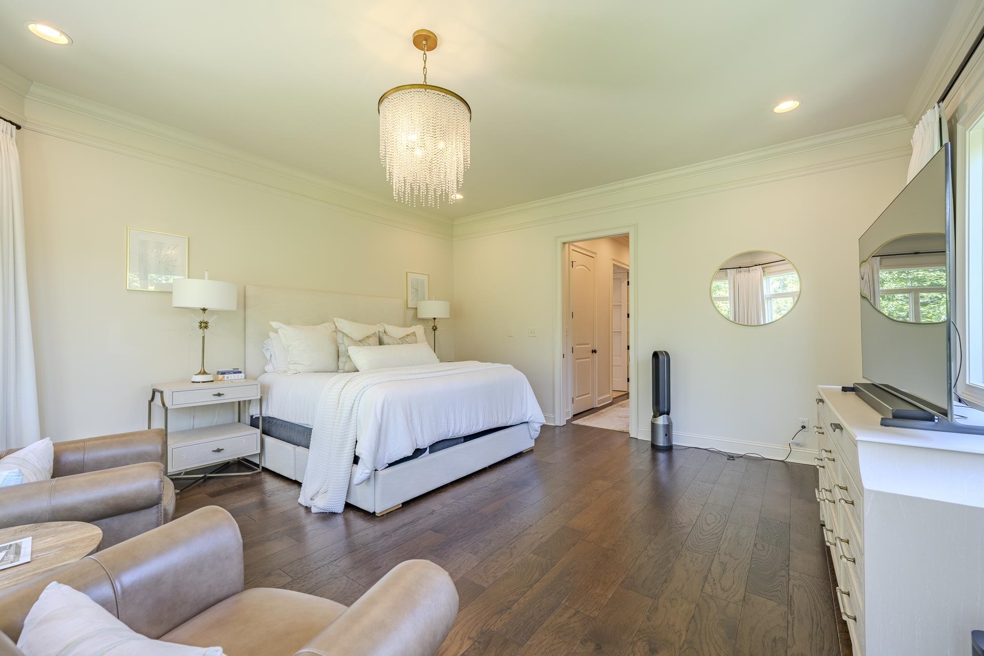 105 Riviera Cove Savannah, TN 38372 - Photo 16 of 40 a bedroom with bed and a flat screen tv