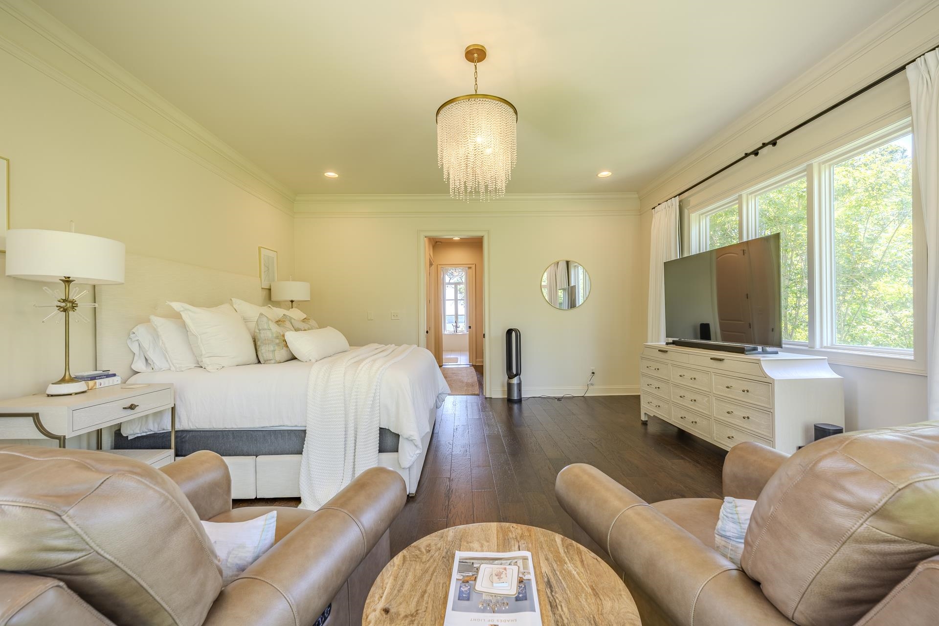 105 Riviera Cove Savannah, TN 38372 - Photo 17 of 40 a living room with furniture chandelier and a flat screen tv
