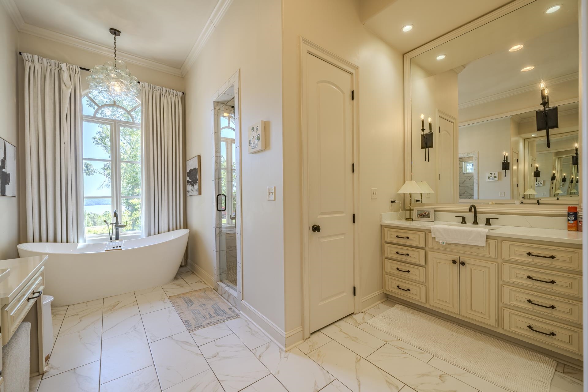 105 Riviera Cove Savannah, TN 38372 - Photo 18 of 40 a bathroom with a sink a toilet and shower