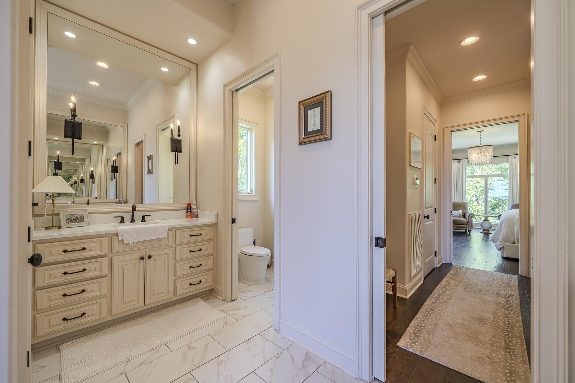 105 Riviera Cove Savannah, TN 38372 - Photo 19 of 40 a bathroom with a double vanity sink and a mirror