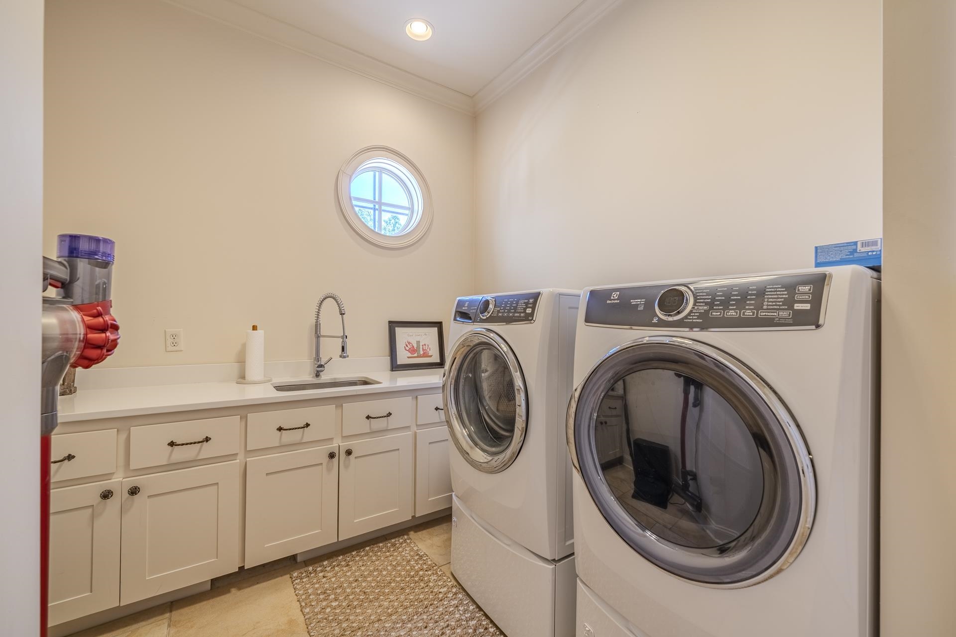 105 Riviera Cove Savannah, TN 38372 - Photo 21 of 40 a utility room with dryer and washer