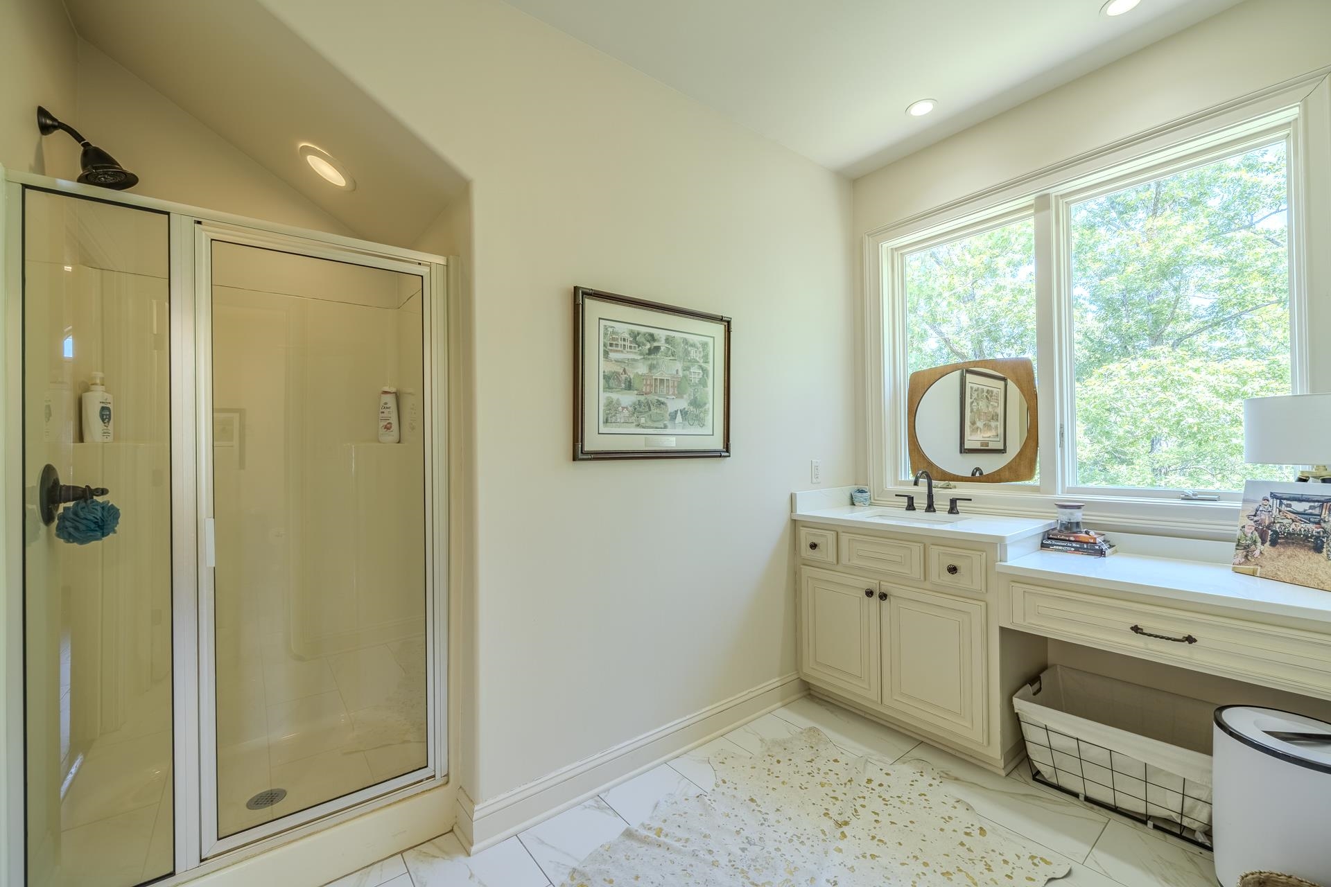 105 Riviera Cove Savannah, TN 38372 - Photo 25 of 40 a bathroom with a granite countertop sink mirror and window
