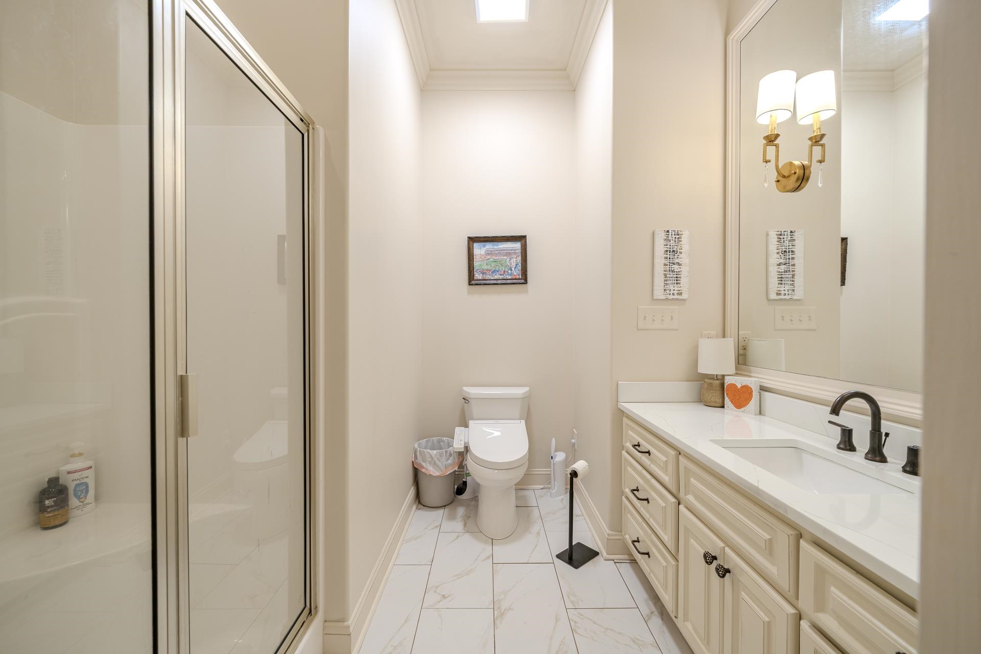 105 Riviera Cove Savannah, TN 38372 - Photo 29 of 40 a spacious bathroom with a double vanity sink toilet and a mirror