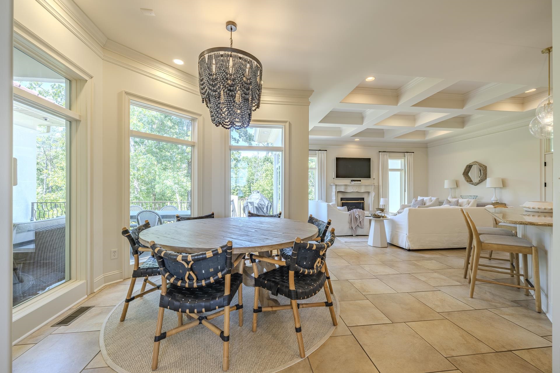 105 Riviera Cove Savannah, TN 38372 - Photo 6 of 40 a dining room with furniture a chandelier and wooden floor