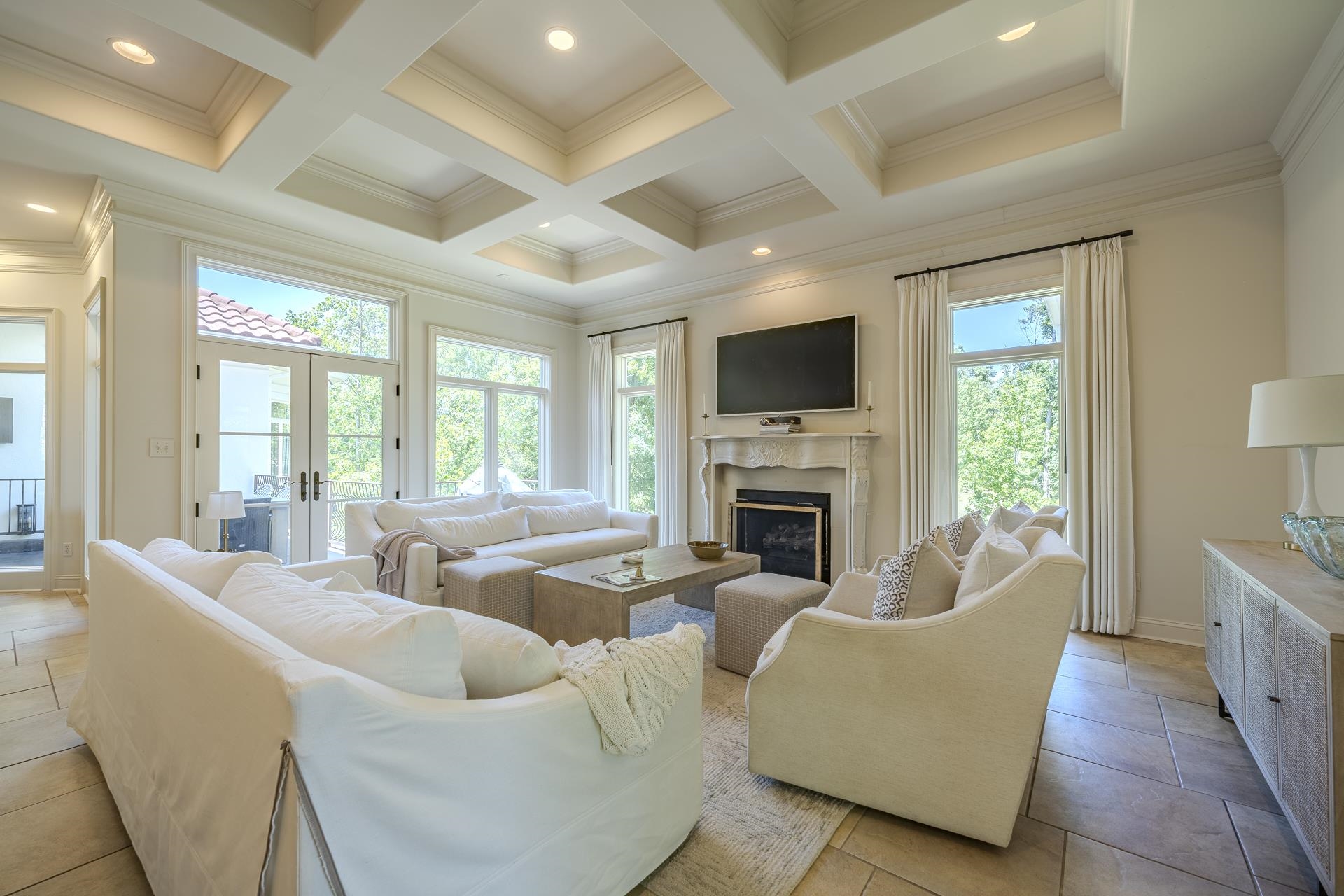 105 Riviera Cove Savannah, TN 38372 - Photo 8 of 40 a living room with furniture fireplace and a large window