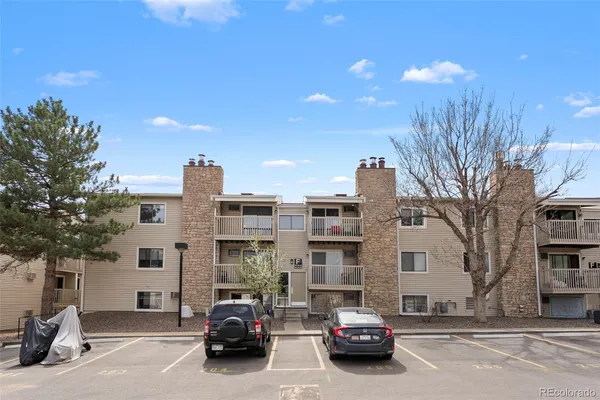 a car parked in front of a building