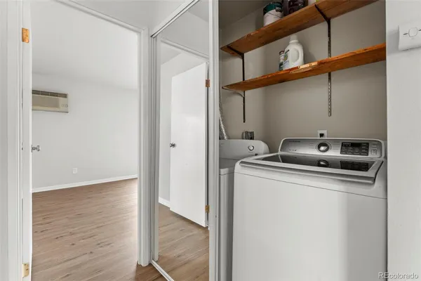 a utility room with washer and dryer