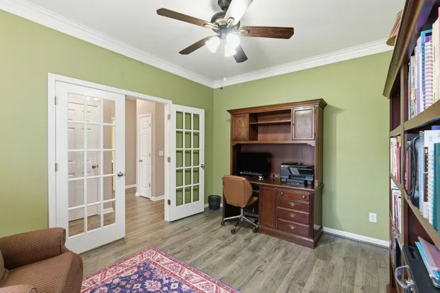 a backyard of house with a trees