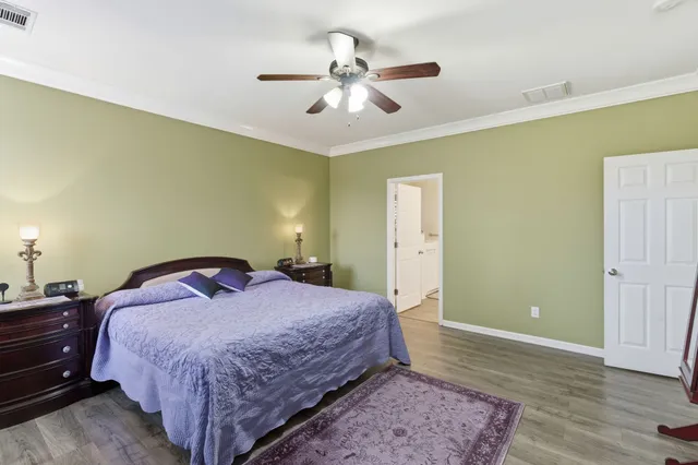 a front view of a house with a yard and porch