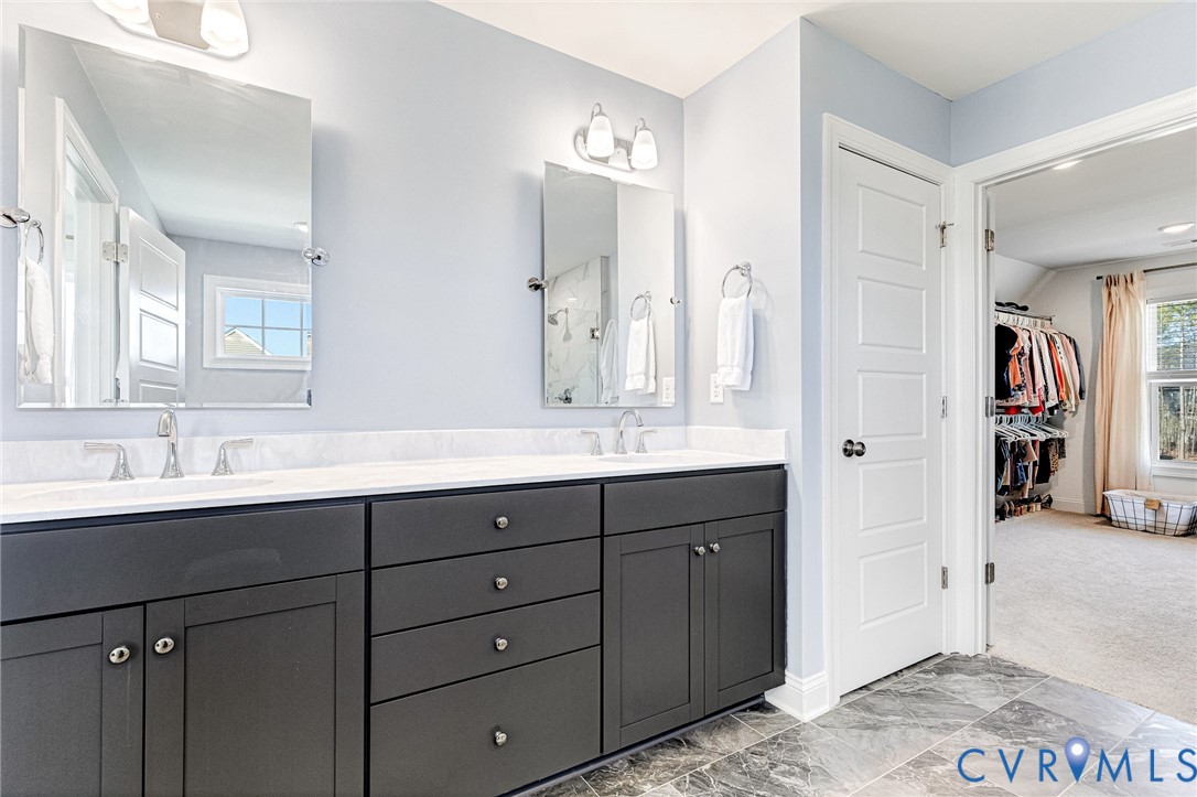 17101 Westington Road Moseley, VA 23120 - Photo 37 of 50 a spacious bathroom with double sink and a mirror