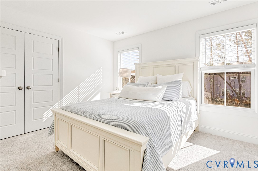 17101 Westington Road Moseley, VA 23120 - Photo 39 of 50 a bedroom with a bed and a window