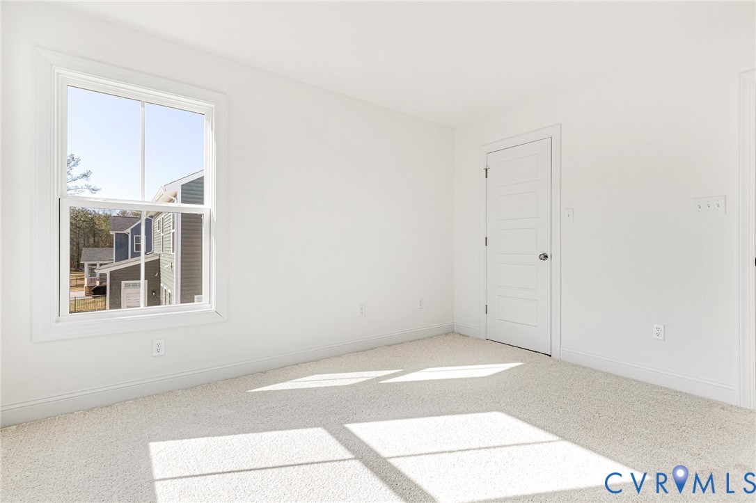 17101 Westington Road Moseley, VA 23120 - Photo 43 of 50 a view of an empty room with a window