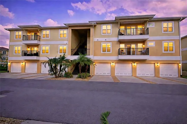 a front view of a multi story residential apartment building