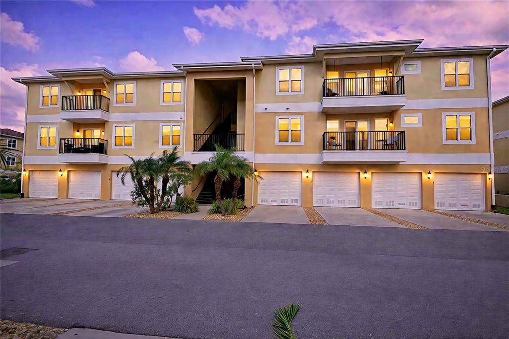 6420 Banyan Boulevard, Unit 303 New Port Richey, FL 34652 - Photo 1 of 54 a front view of a multi story residential apartment building