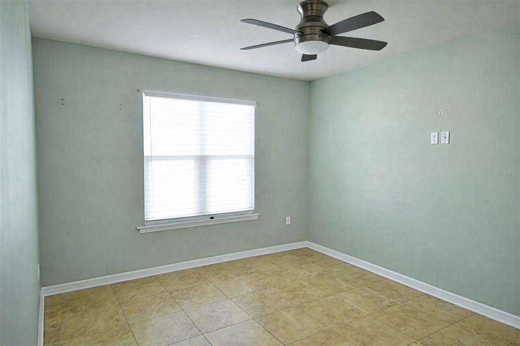 6420 Banyan Boulevard, Unit 303 New Port Richey, FL 34652 - Photo 28 of 54 an empty room with a window