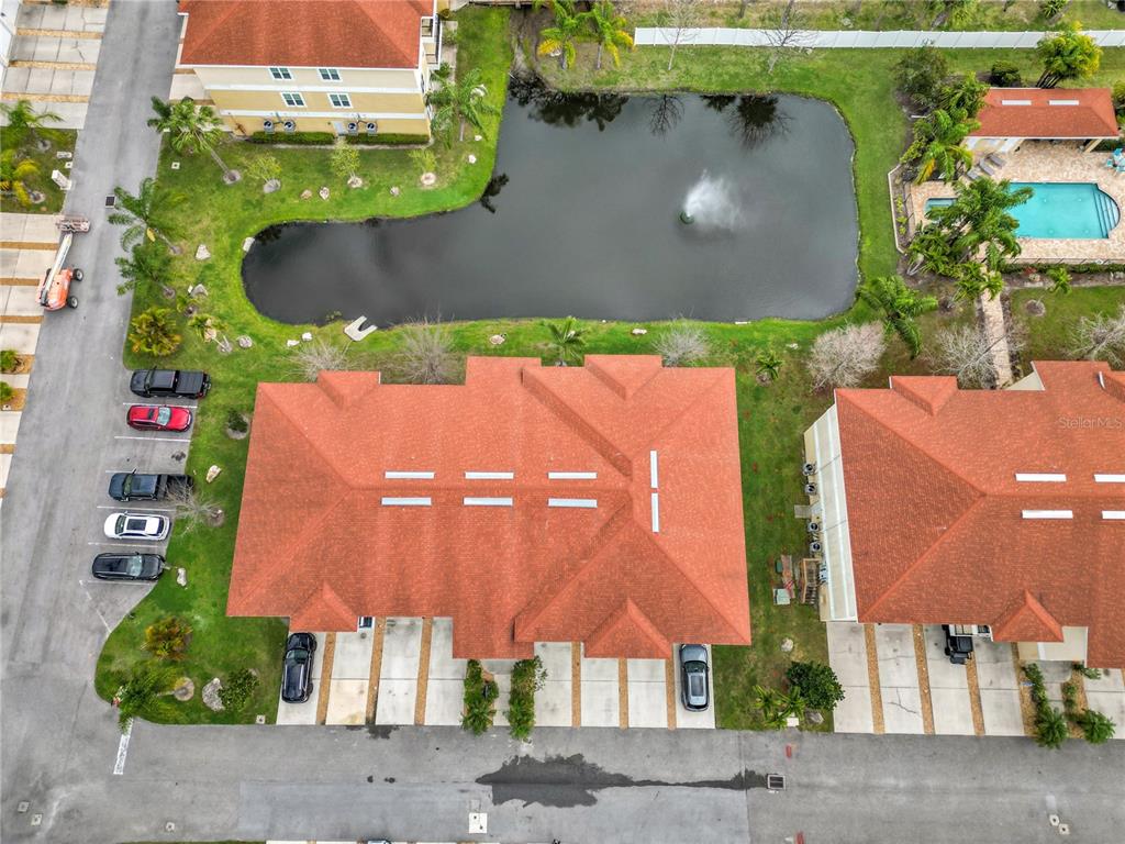 6420 Banyan Boulevard, Unit 303 New Port Richey, FL 34652 - Photo 29 of 54 an aerial view of houses with yard