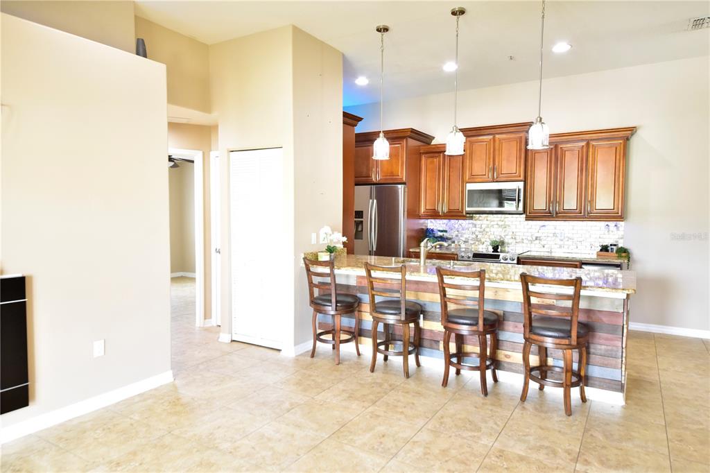 6420 Banyan Boulevard, Unit 303 New Port Richey, FL 34652 - Photo 10 of 54 a view of a dining area with furniture