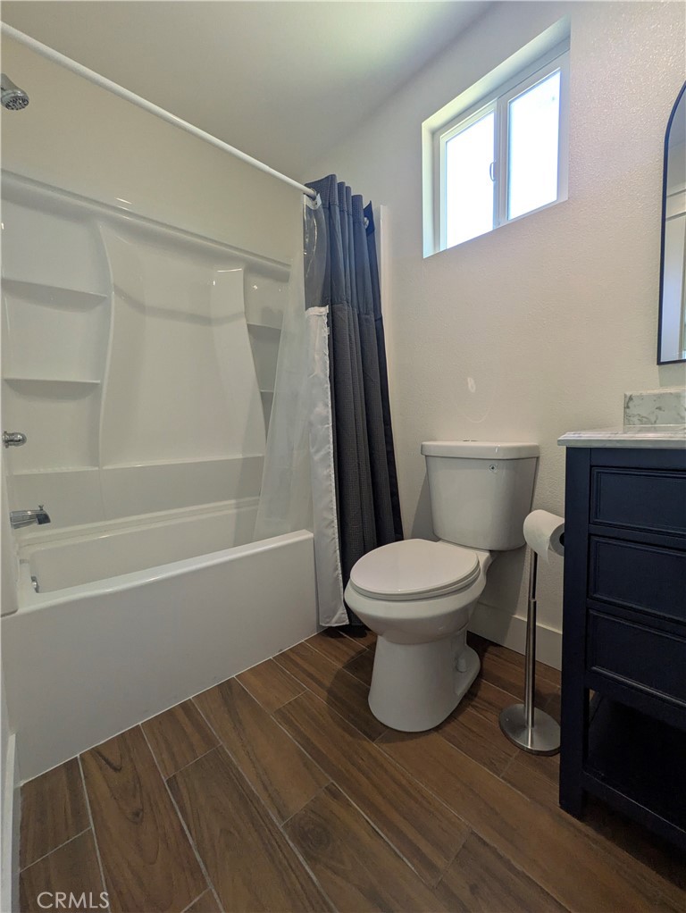 4803 Beatty Drive Riverside, CA 92506 - Photo 5 of 5 a bathroom with a toilet and a shower
