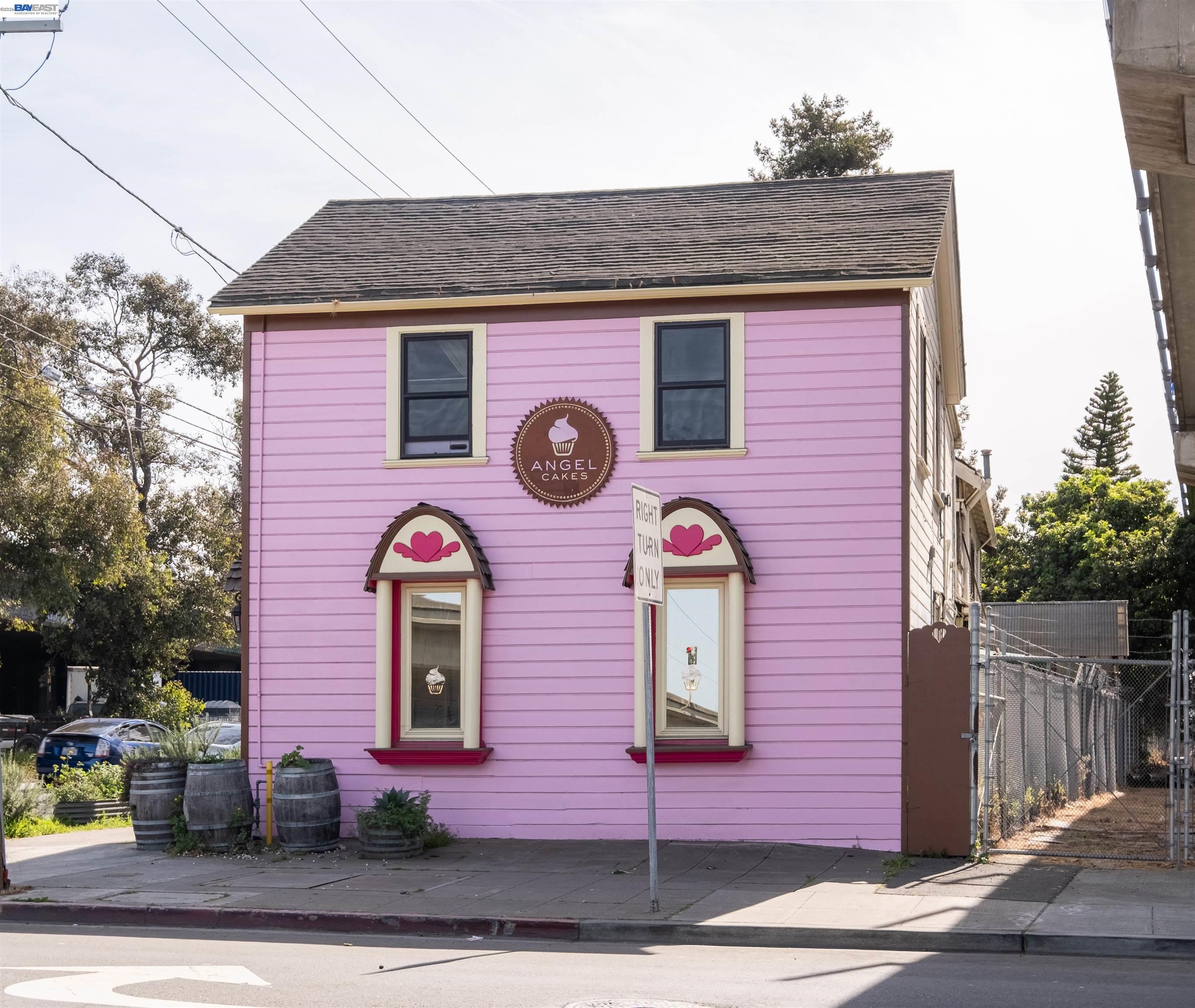 745 Fifth Street Oakland, CA 94607 - Photo 2 of 26 a front view of a house with a yard