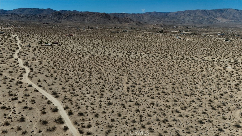 774 Manzanita Road Johnson Valley, CA 92285 - Photo 11 of 16 Red boundary lines on pictures are an estimate and for marketing purposes only. Buyer to verify all aspects of this property including, but not limited to utilities, assessments, boundaries, usage, access, and zoning to satisfy themselves.
