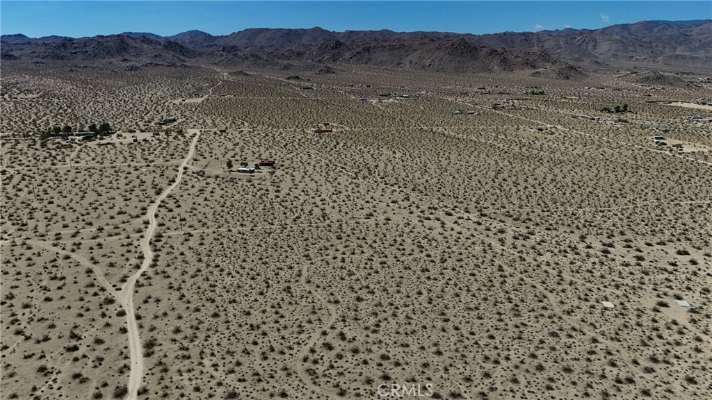 774 Manzanita Road Johnson Valley, CA 92285 - Photo 12 of 16 Red boundary lines on pictures are an estimate and for marketing purposes only. Buyer to verify all aspects of this property including, but not limited to utilities, assessments, boundaries, usage, access, and zoning to satisfy themselves.