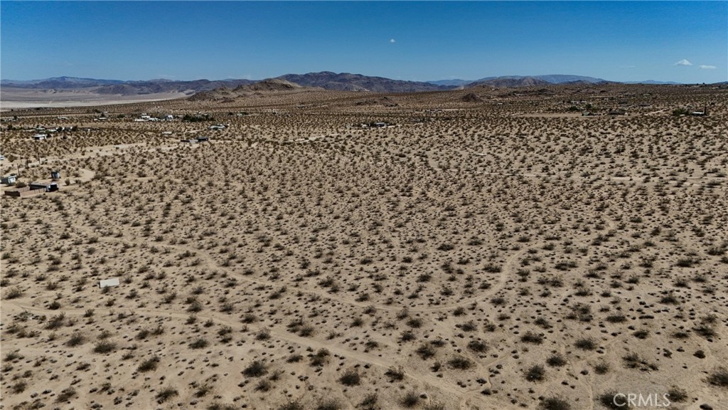 774 Manzanita Road Johnson Valley, CA 92285 - Photo 2 of 16 Red boundary lines on pictures are an estimate and for marketing purposes only. Buyer to verify all aspects of this property including, but not limited to utilities, assessments, boundaries, usage, access, and zoning to satisfy themselves.
