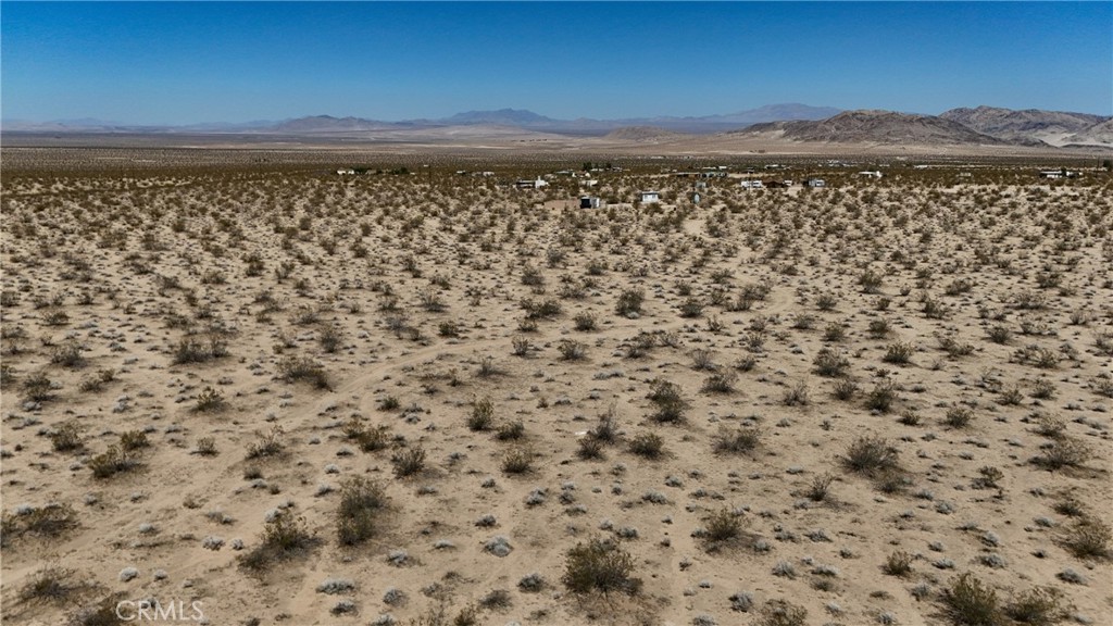774 Manzanita Road Johnson Valley, CA 92285 - Photo 5 of 16 Red boundary lines on pictures are an estimate and for marketing purposes only. Buyer to verify all aspects of this property including, but not limited to utilities, assessments, boundaries, usage, access, and zoning to satisfy themselves.