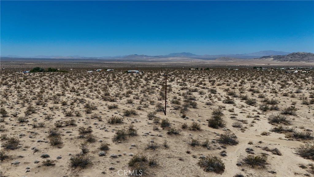 774 Manzanita Road Johnson Valley, CA 92285 - Photo 7 of 16 Red boundary lines on pictures are an estimate and for marketing purposes only. Buyer to verify all aspects of this property including, but not limited to utilities, assessments, boundaries, usage, access, and zoning to satisfy themselves.
