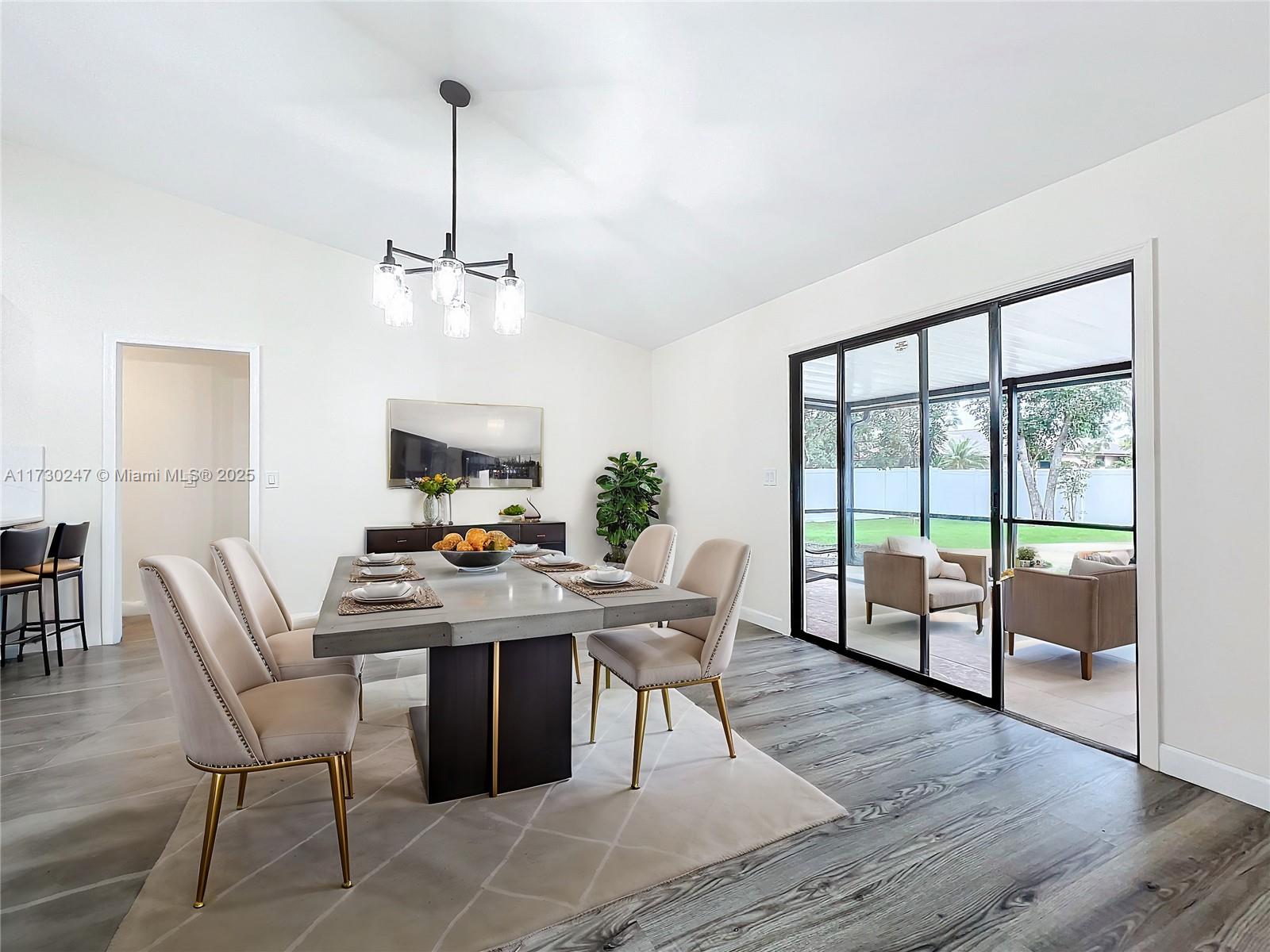 521 Southwest Rabbit Avenue Port St. Lucie, FL 34953 - Photo 26 of 45 a view of a dining room with furniture window and wooden floor