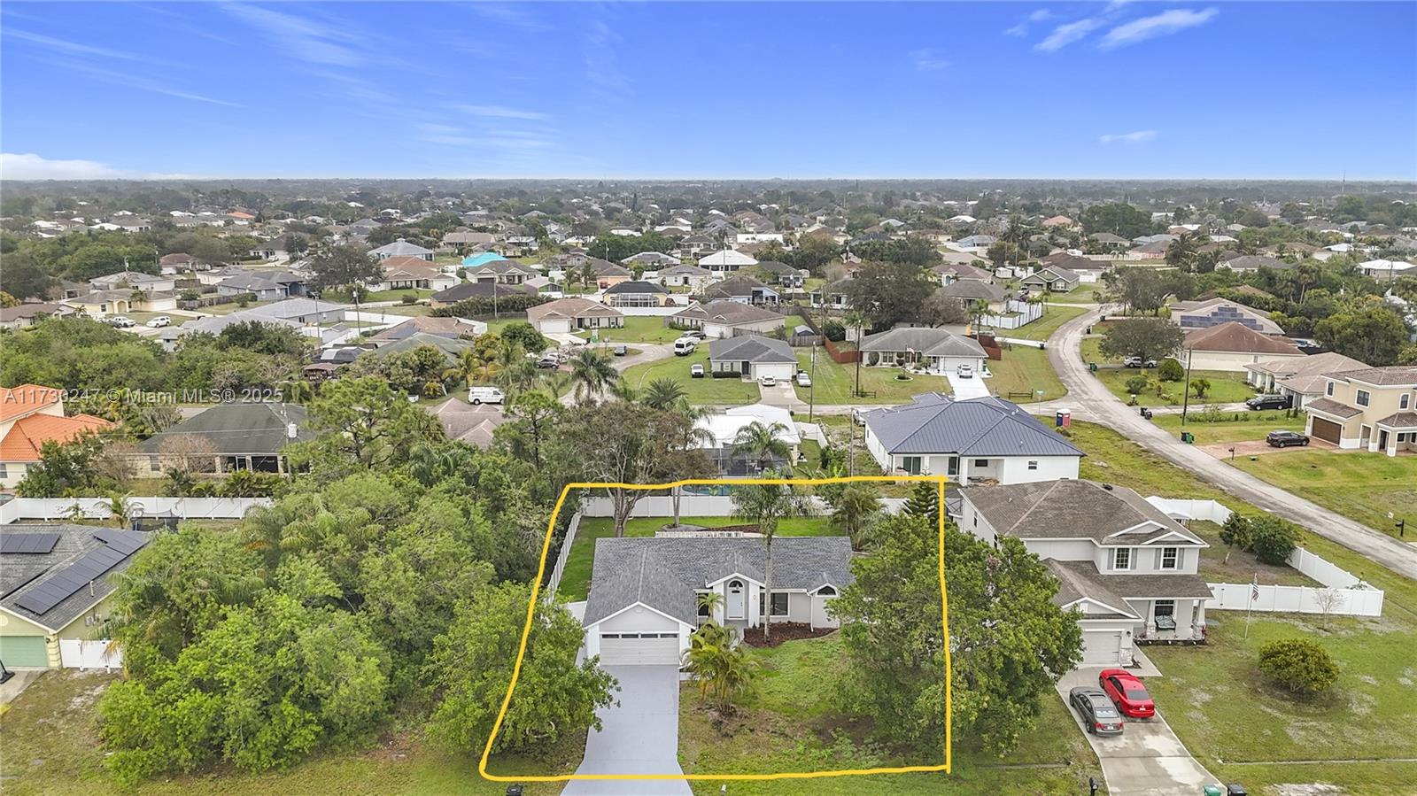 521 Southwest Rabbit Avenue Port St. Lucie, FL 34953 - Photo 4 of 45 an aerial view of residential houses with outdoor space