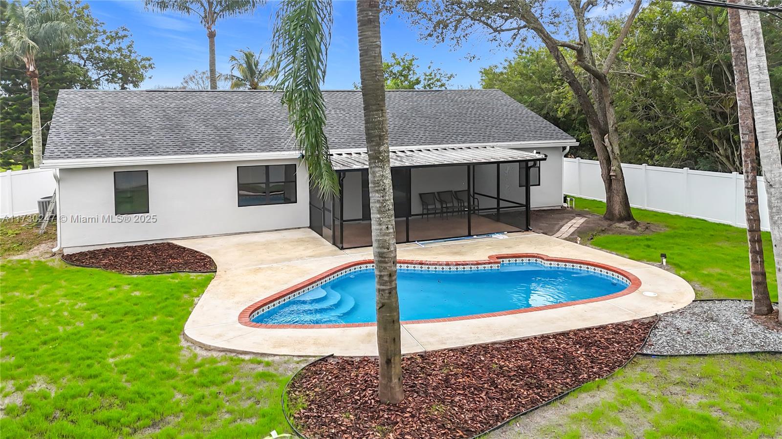 521 Southwest Rabbit Avenue Port St. Lucie, FL 34953 - Photo 10 of 45 a view of a house with backyard