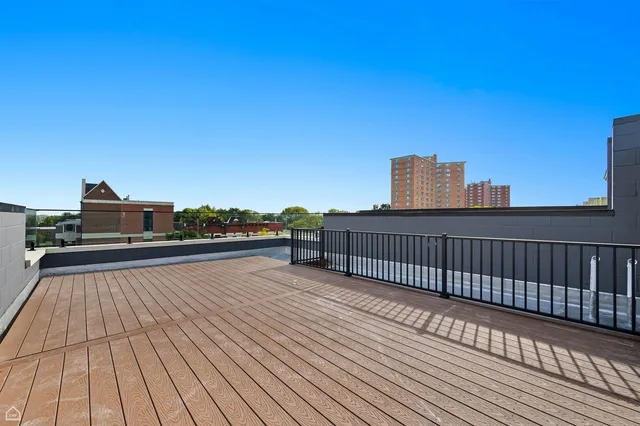 a view of balcony with furniture