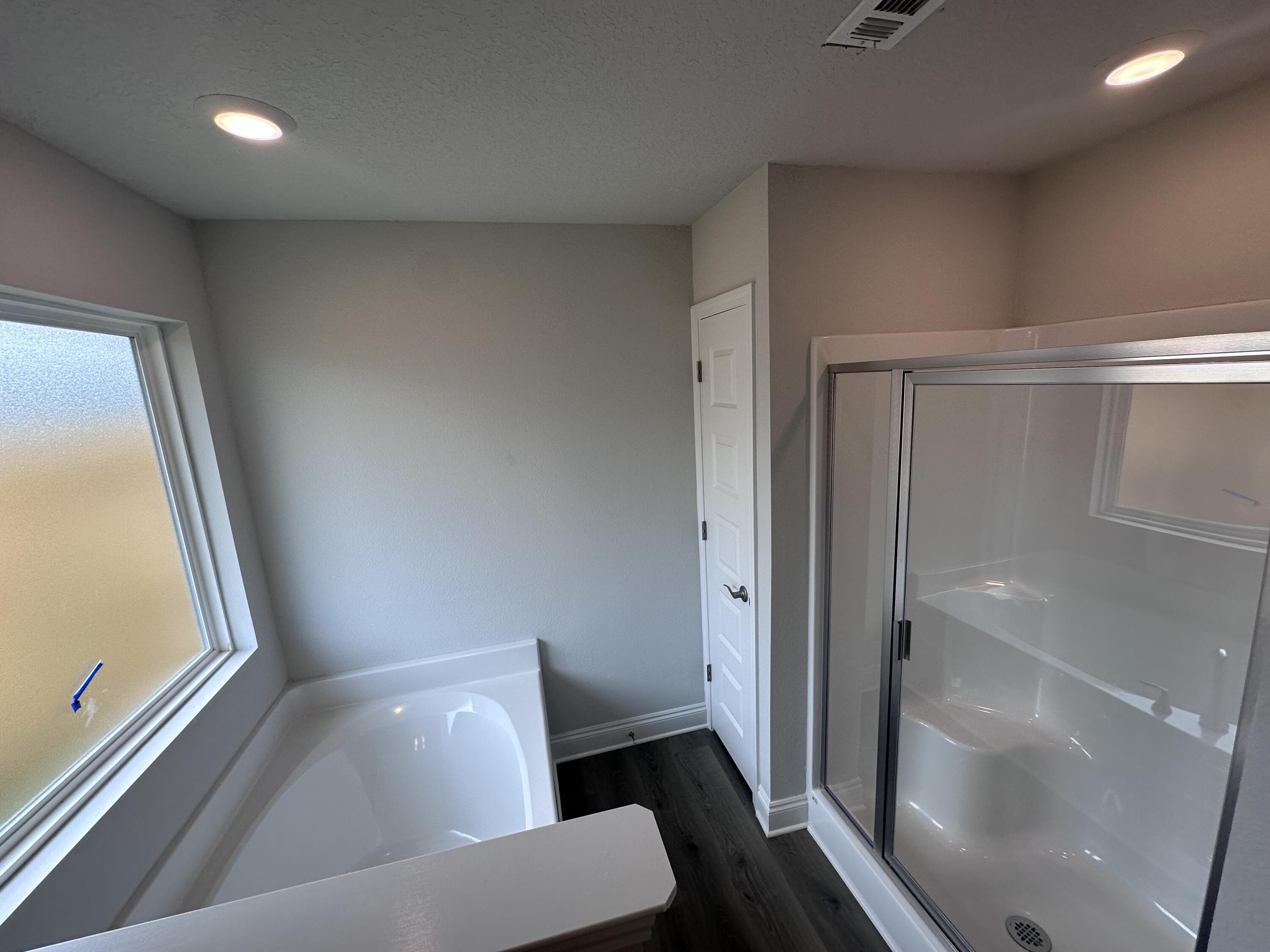 6114 Buckshot Drive Crestview, FL 32539 - Photo 3 of 22 a view of a small space with wooden floor and furniture