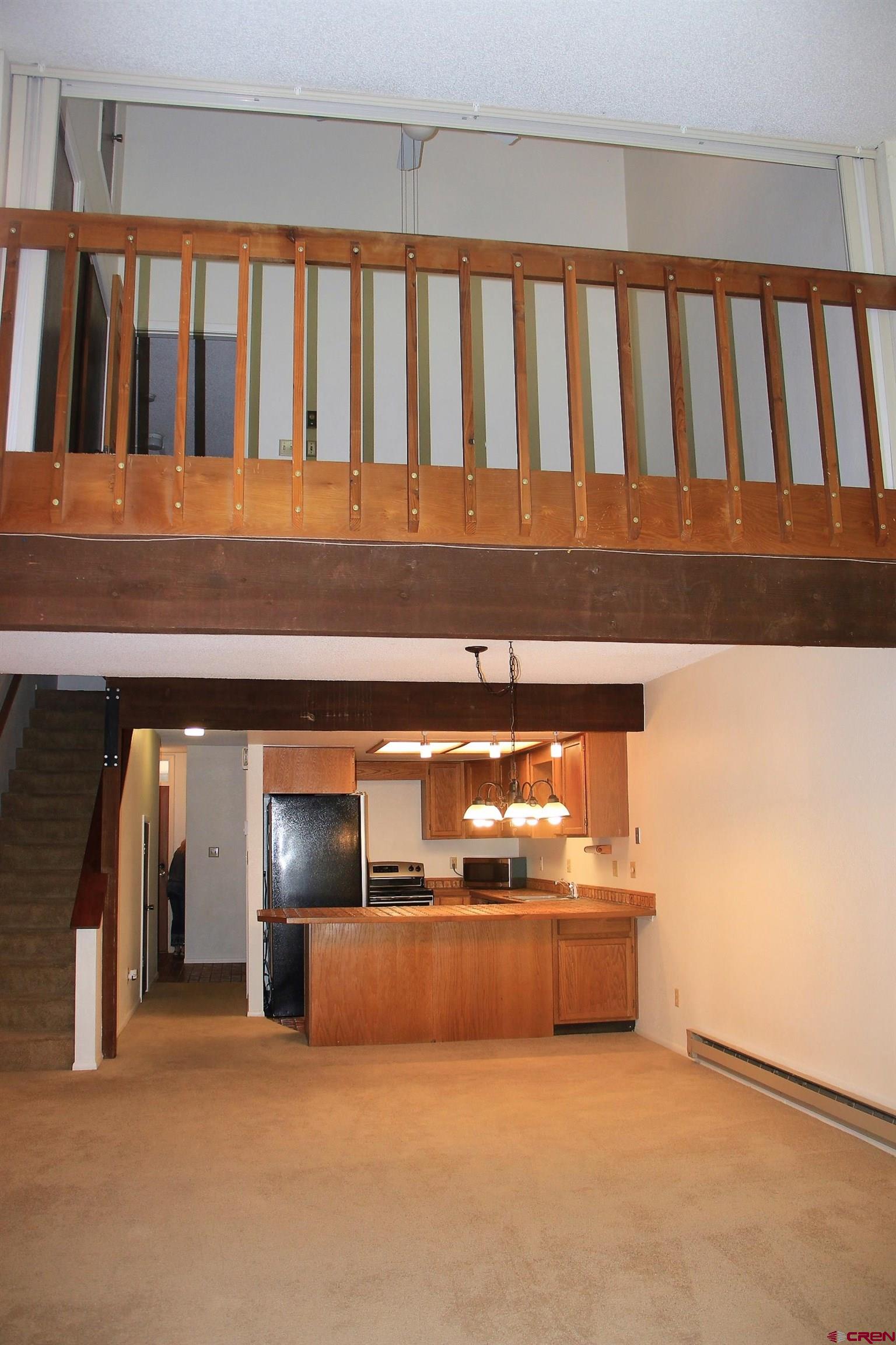 1825 Florida Road, Unit 103 Durango, CO 81301 - Photo 27 of 34 a view of an empty room with a fireplace