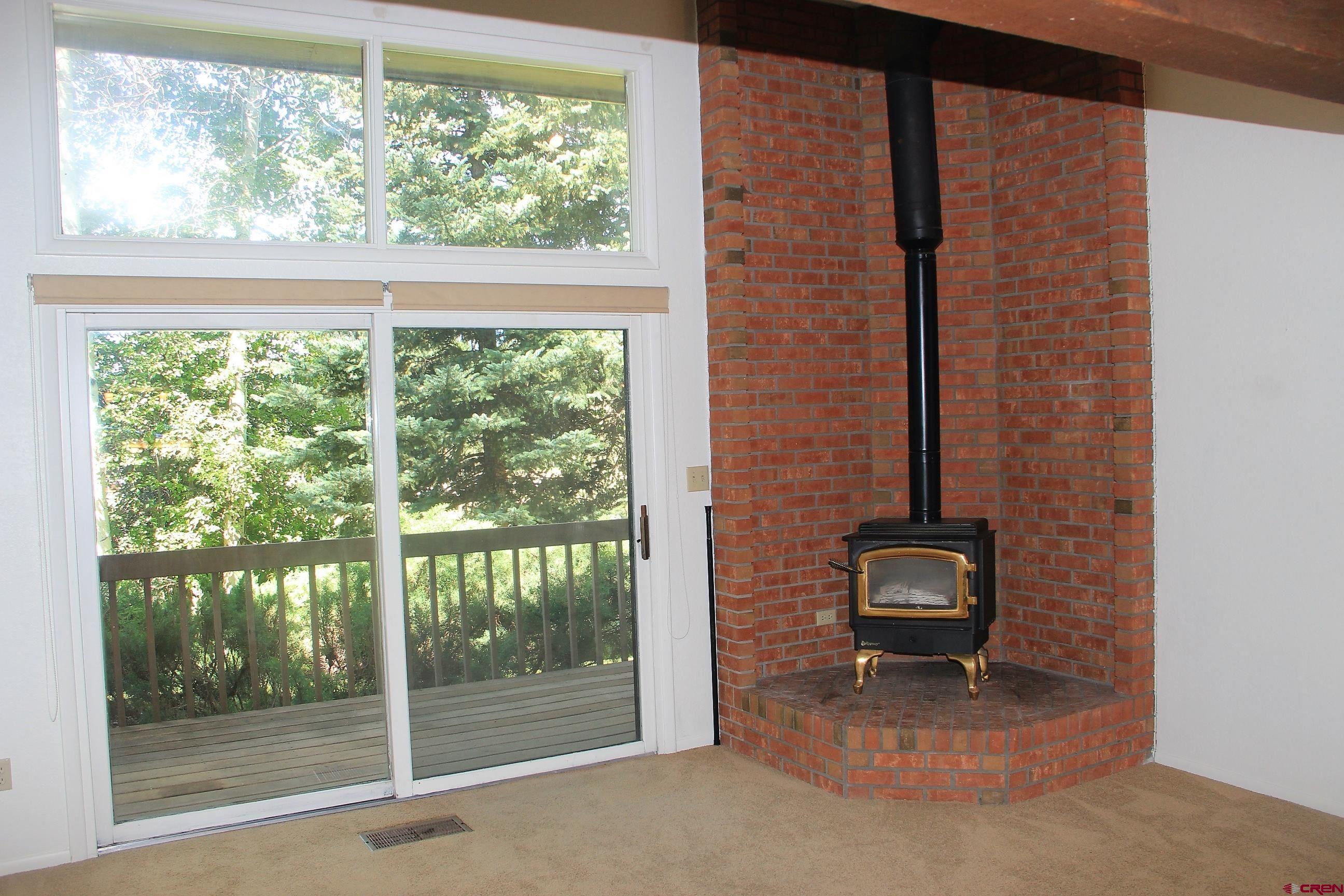 1825 Florida Road, Unit 103 Durango, CO 81301 - Photo 29 of 34 a view of a couple of floor to ceiling window and chair