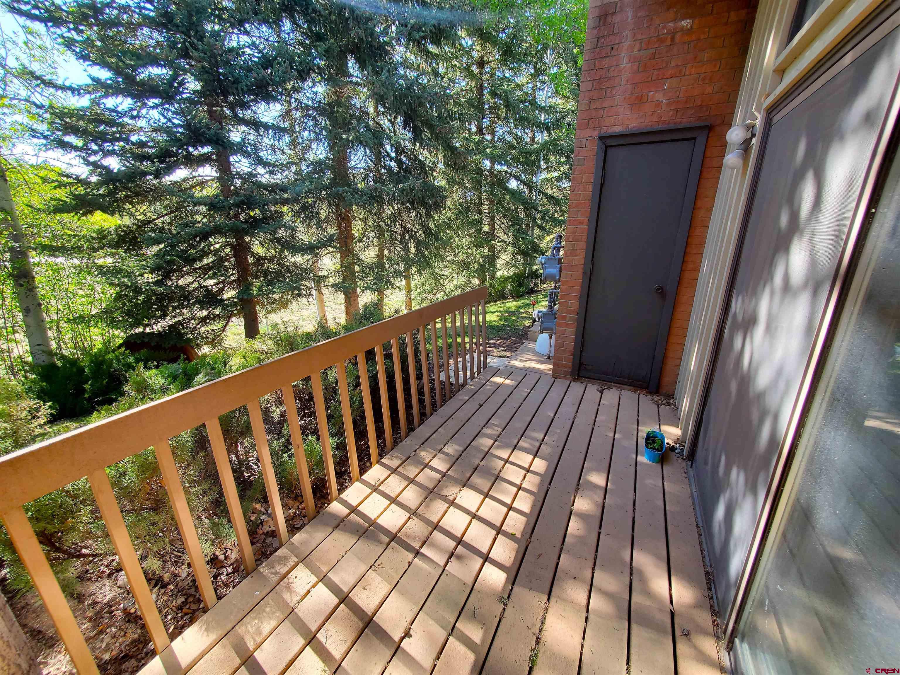 1825 Florida Road, Unit 103 Durango, CO 81301 - Photo 31 of 34 a view of balcony with wooden floor