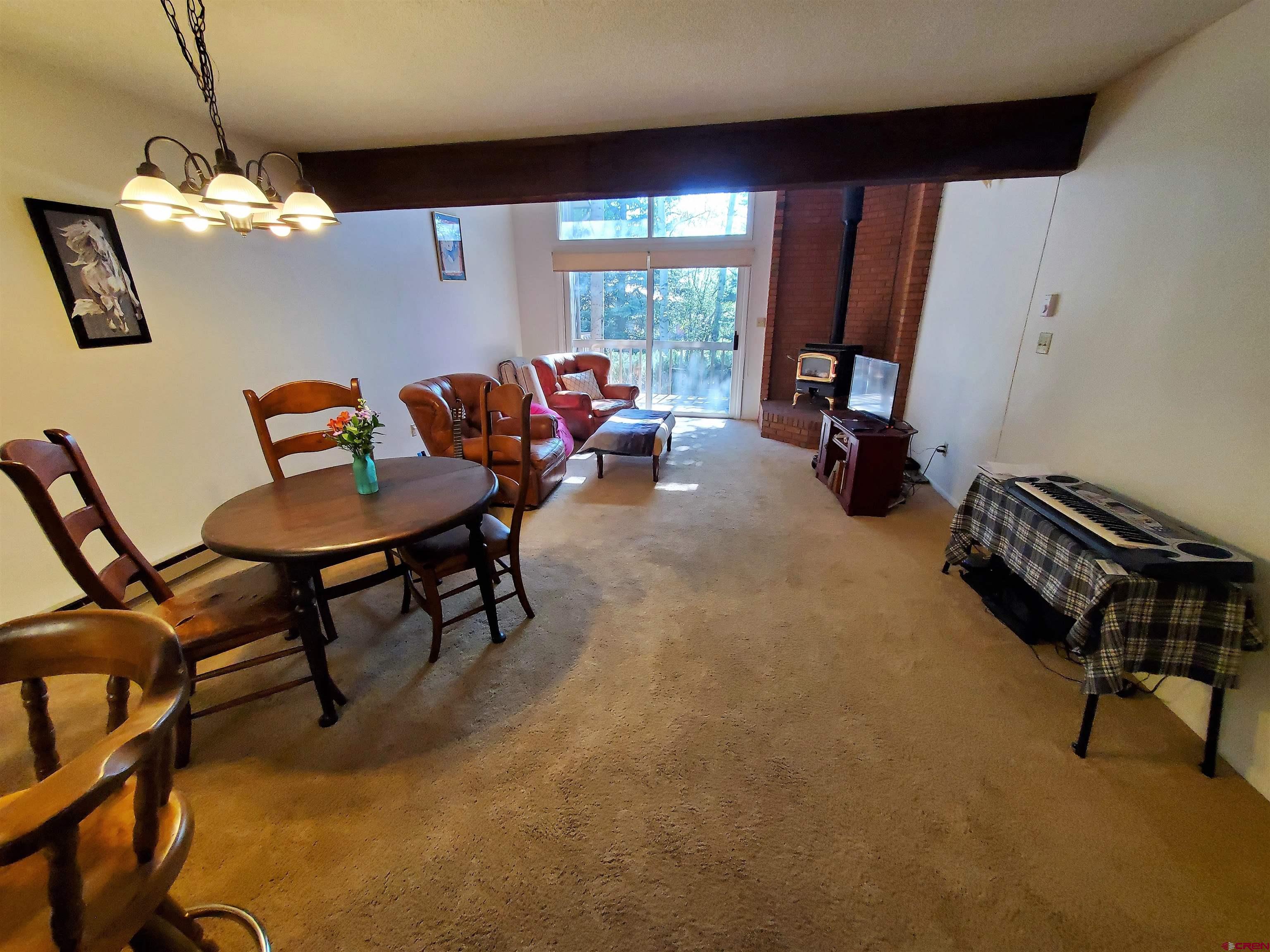 1825 Florida Road, Unit 103 Durango, CO 81301 - Photo 8 of 34 a living room with furniture and a window