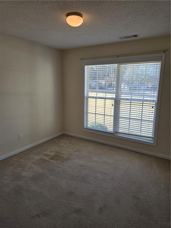 607 McDowell Lane Bethlehem, GA 30620 - Photo 19 of 22 an empty room with a window