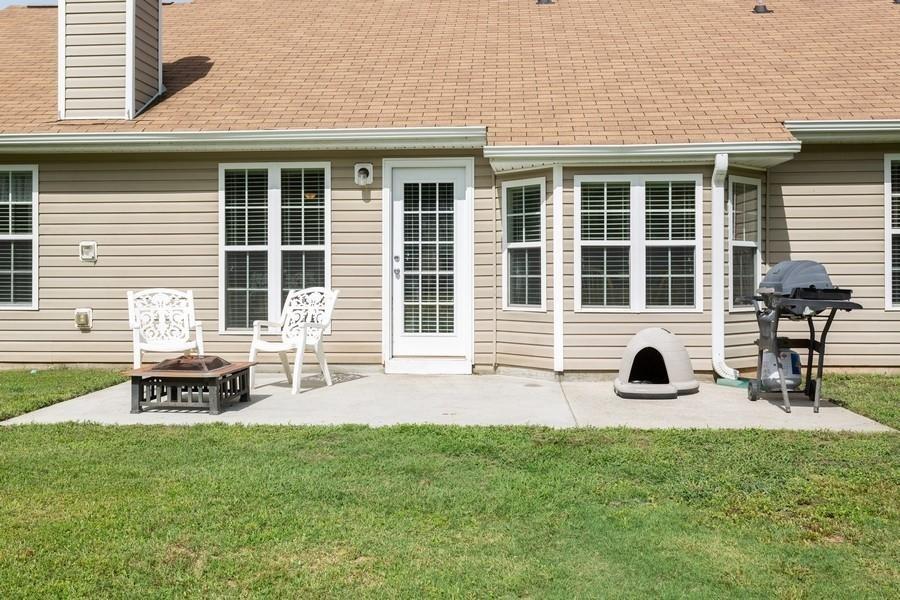607 McDowell Lane Bethlehem, GA 30620 - Photo 22 of 22 a front view of a house with patio and wooden play ground