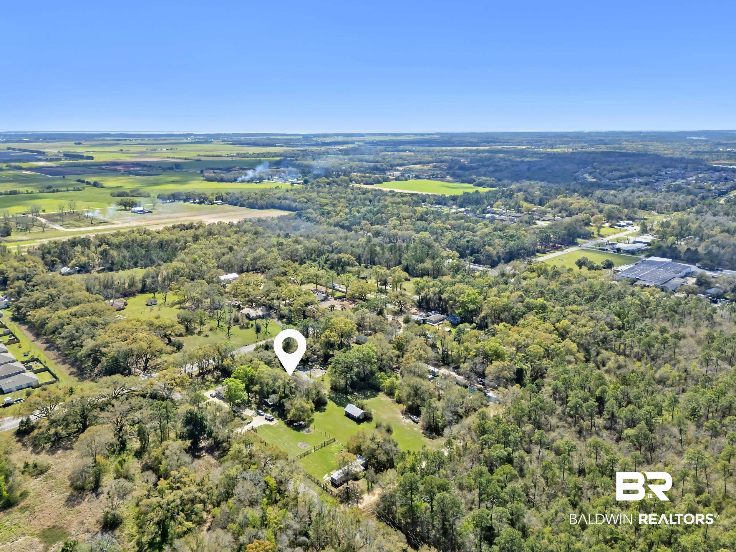 17463 Highway 98 Foley, AL 36535 - Photo 43 of 57 Aerial view of a heavily wooded area