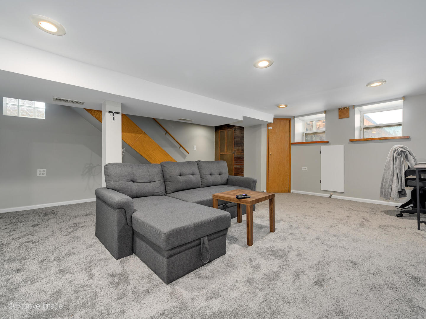 941 West Altgeld Street Chicago, IL 60614 - Photo 16 of 18 a living room with furniture and a flat screen tv