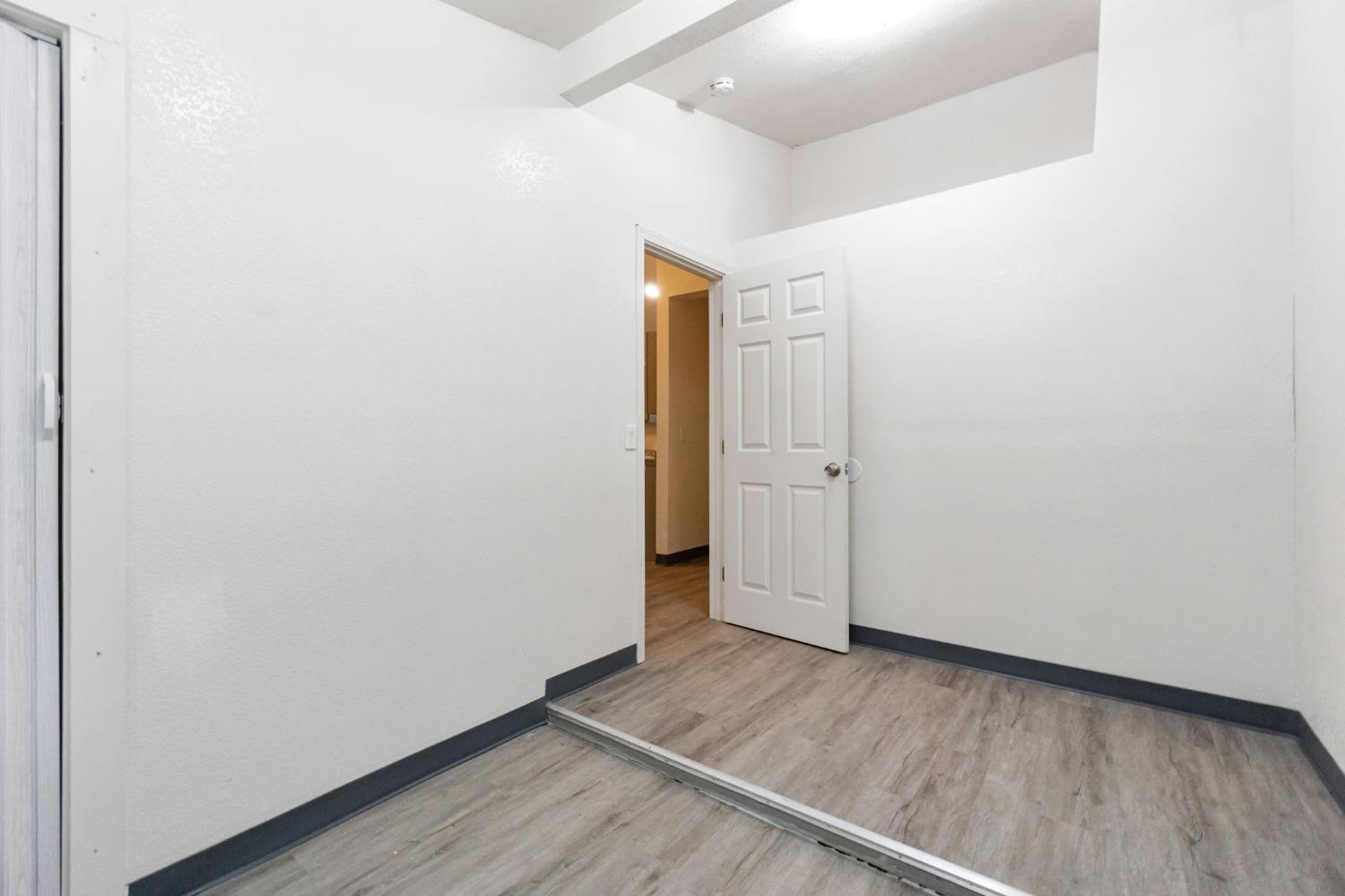 46801 Dunlap Road Miramonte, CA 93641 - Photo 13 of 28 an empty room with wooden floor